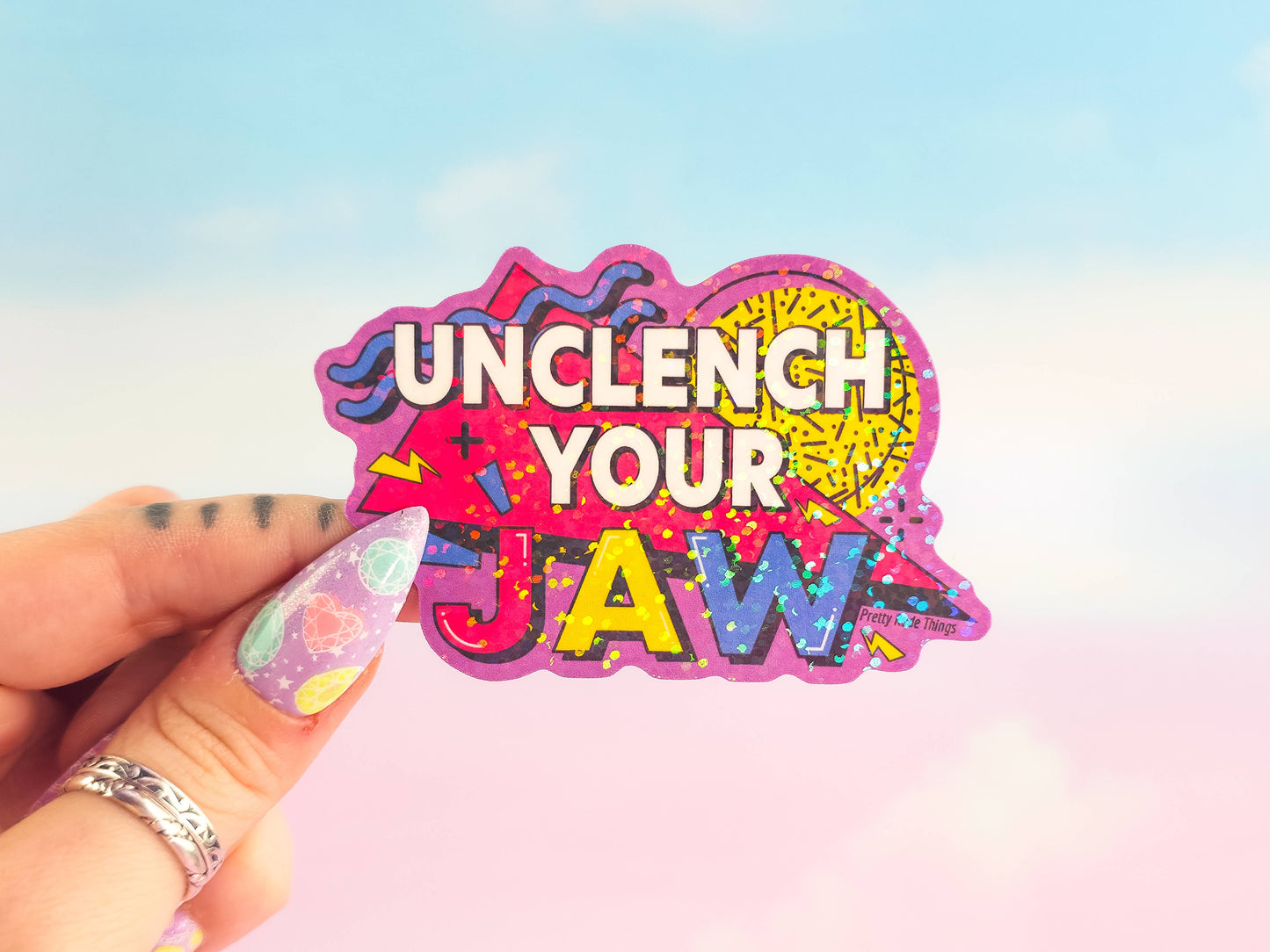 Unclench Your Jaw Holographic Sticker