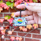 All Part of the Same Universe Enamel Keychain