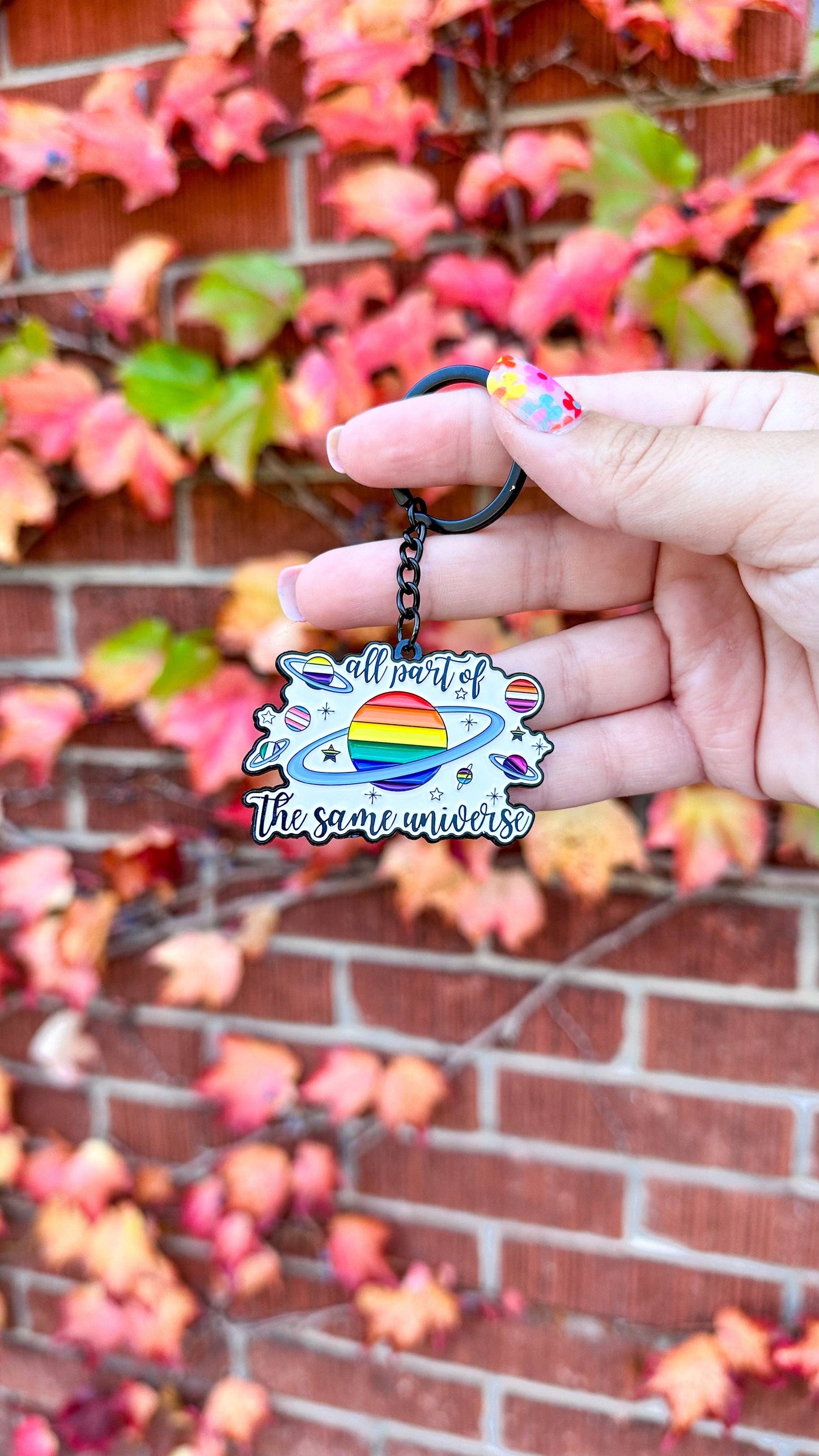 All Part of the Same Universe Enamel Keychain